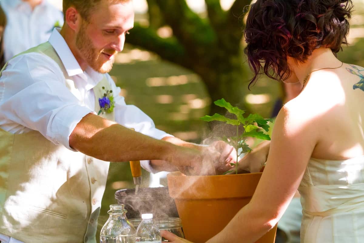 Tree planting ceremony during the wedding of this bride and groom.