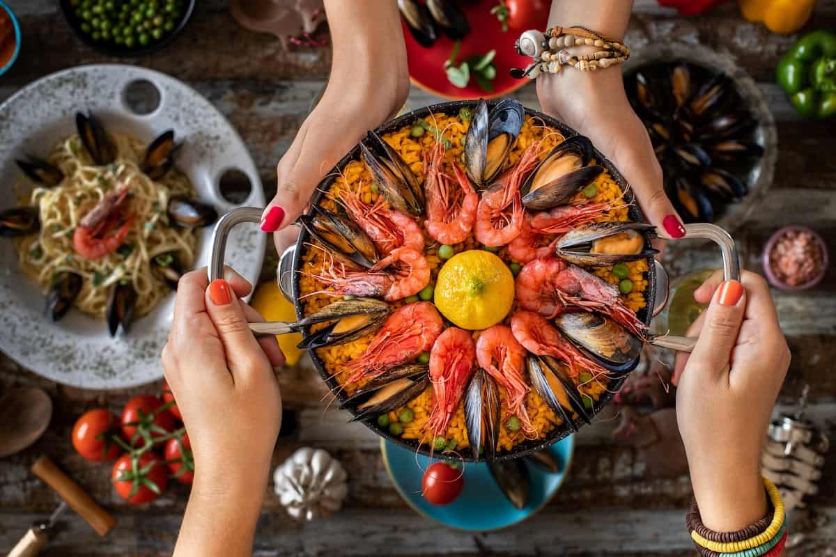 Seafood pasta and paella with mussels. Spaghetti Alle Vongole .