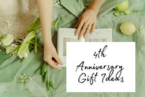 4th anniversary gift ideas sign with flowers and fruit background